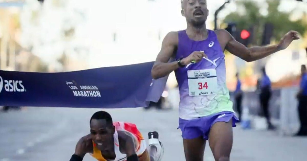 High school coach closes gap with leader to win L.A. marathon in closest-ever finish