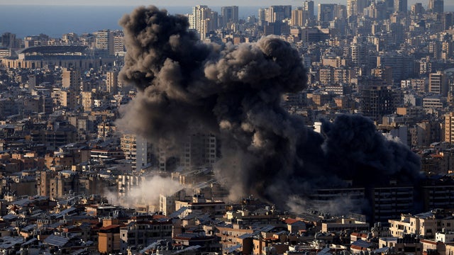 FILE PHOTO: Smoke billows after an Israeli strike on Beirut's southern suburbs 