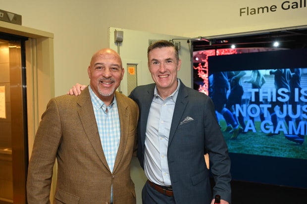 People pose for photos during an event at the National Liberty Museum 