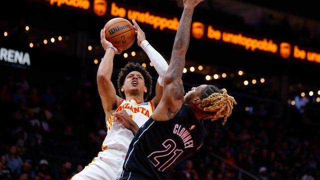 Jalen Johnson #1 of the Atlanta Hawks goes up for a shot against Noah Clowney #21 of the Brooklyn Nets during the third quarter at State Farm Arena on March 12, 2026 in Atlanta, Georgia. 