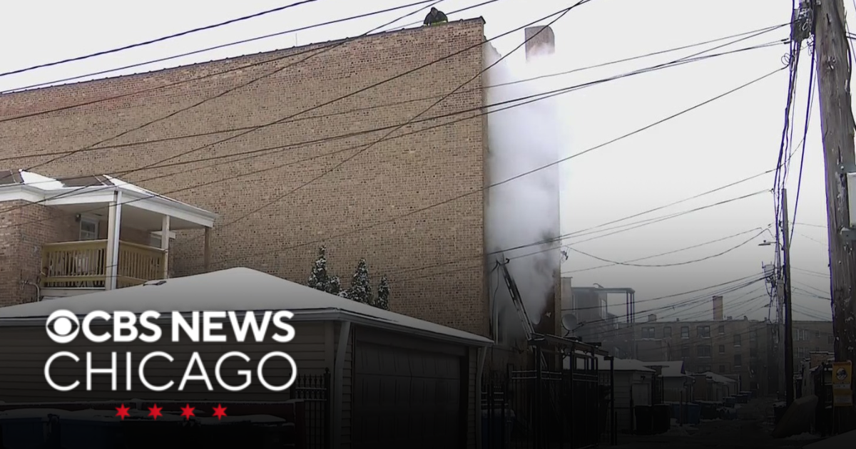 Firefighter hospitalized after extra alarm fire in Rogers Park - CBS ...