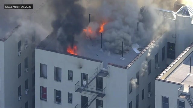 An aerial view of a Queens apartment building on fire 