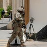 U.S. and French soldiers stand guard in the Green Zone of the Iraqi capital of Baghdad on May 22, 2025. 