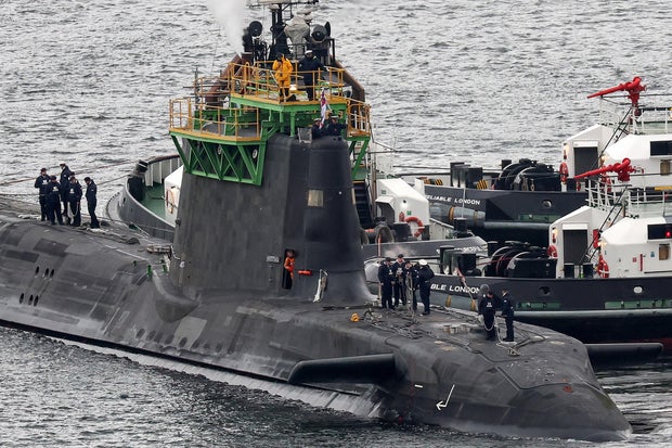 HMS Artful, an Astute-class nuclear-powered fleet submarine, maneuvers at His Majesty's Naval Base Clyde, March 4, 2025, in Faslane, Scotland.