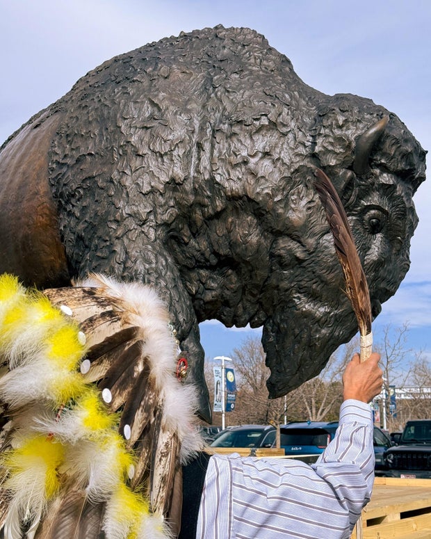 chief-calvin-standing-bear-sicangu-and-oglala-lakota-speaks-a-prayer-over-the-bronze-bison-smithsonian.jpg 