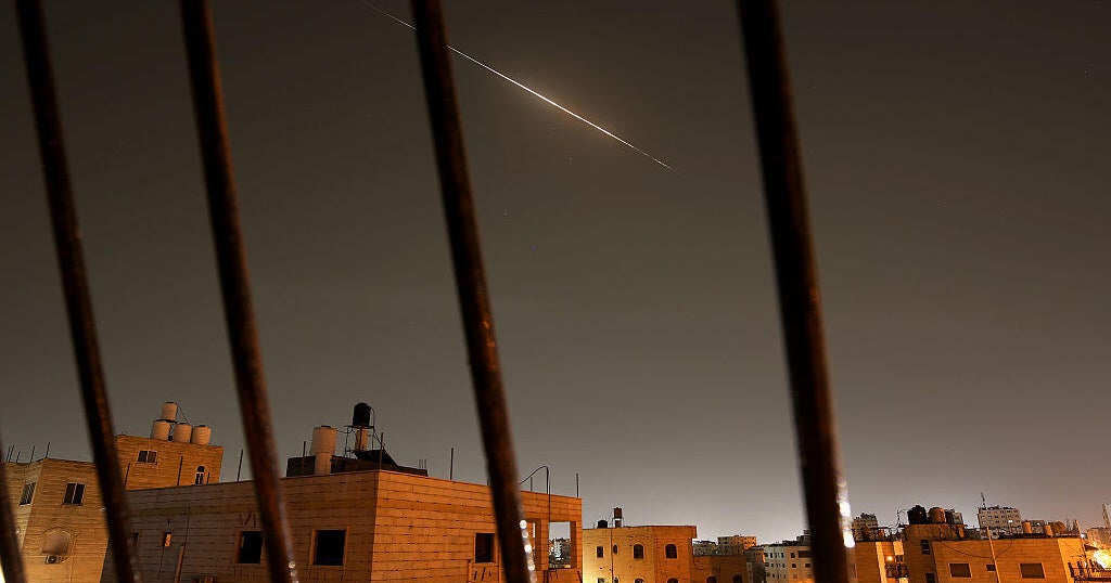 Iran warns of "irreversible damage" to region after Trump attack threat