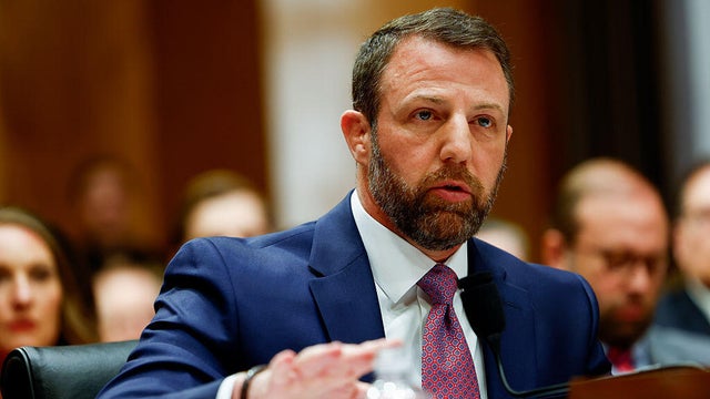 Sen. Markwayne Mullin of Oklahoma, President Trump's nominee for DHS secretary, speaks during a Senate Homeland Security and Governmental Affairs Committee confirmation hearing in Washington, D.C., on March 18, 2026. 