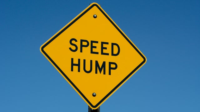 A speed bump highway sign 