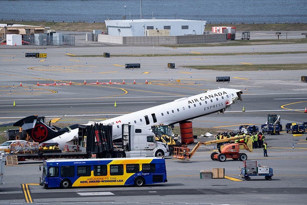Crews remove plane wreckage after deadly LaGuardia crash
