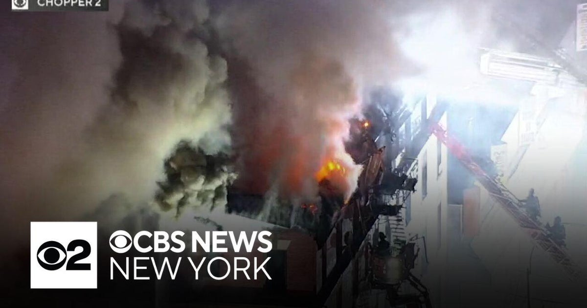 Bronx apartment fire leaves 1 dead, several firefighters injured - CBS ...