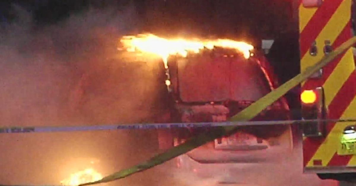 Driver burned after car bursts into flames following crash in Miami