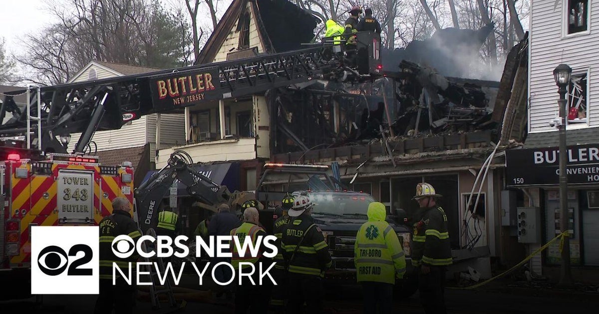 Video shows Butler, N.J., building partially collapse during fire - CBS ...