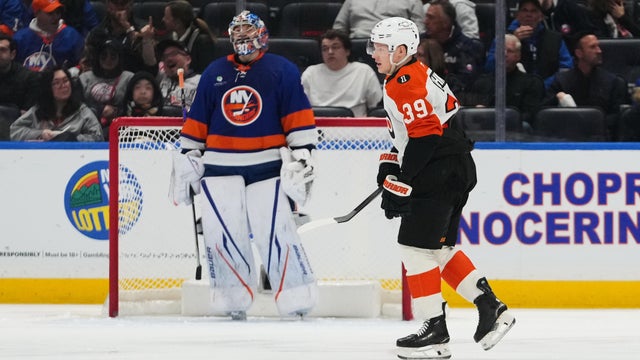 Philadelphia Flyers' Matvei Michkov (39) skates past New York Islanders goaltender Ilya Sorokin (30) after scoring a goal during the second period of an NHL hockey game Friday, April 3, 2026, in Elmont, N.Y. 