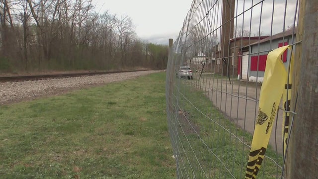 Generic police lights and yellow police tape at crime scene 