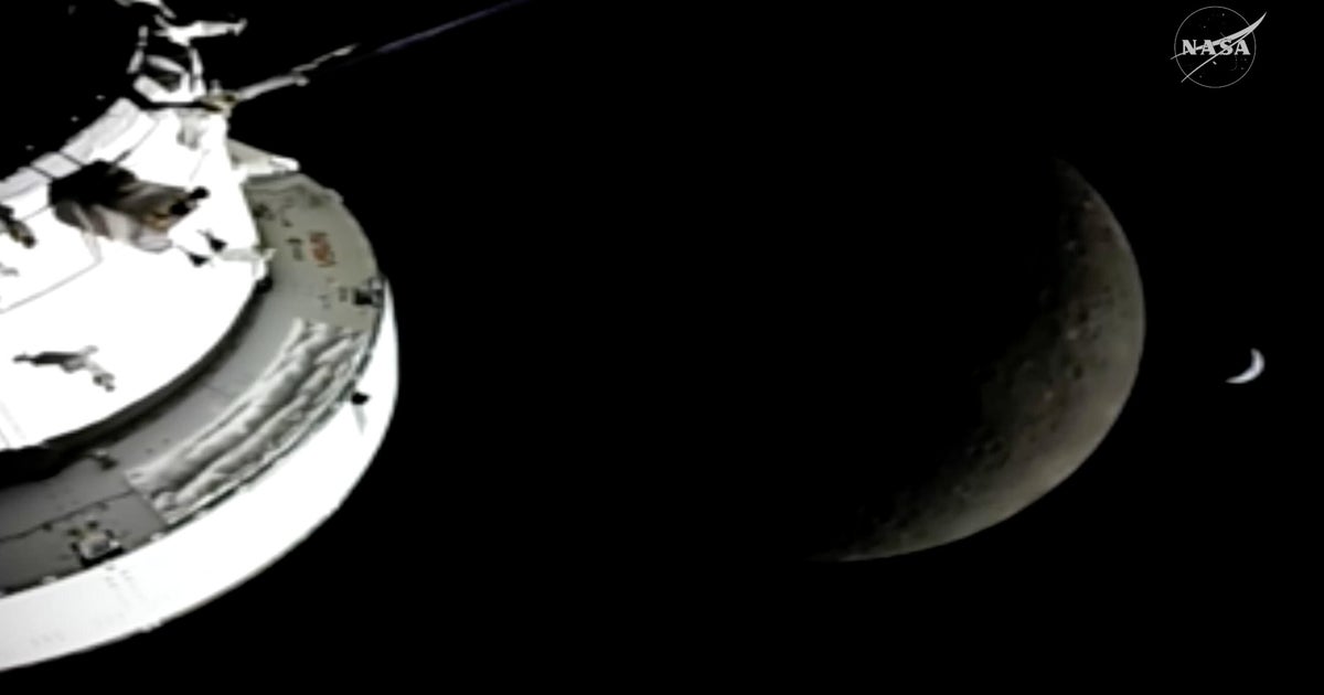 Artemis II crew completes trip around moon after record-breaking day