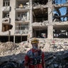 A rescue team member of the Iranian Red Crescent Society stands among the ruins of buildings in eastern Tehran, Iran, on April 9, 2026. 
