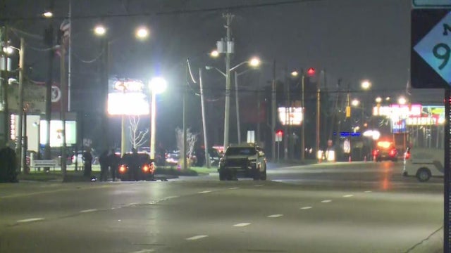 Generic police lights and yellow police tape at crime scene 