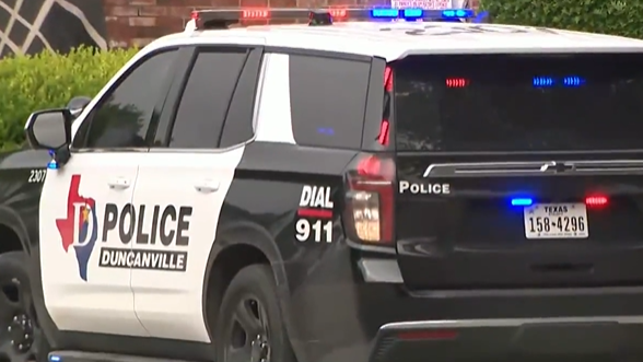 Generic police lights and yellow police tape at crime scene 