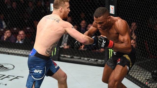 Justin Gaethje punches Edson Barboza of Brazil in their lightweight bout during the UFC Fight Night event at Wells Fargo Center on March 30, 2019 in Philadelphia 