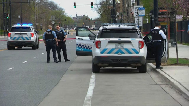 Generic police lights and yellow police tape at crime scene 