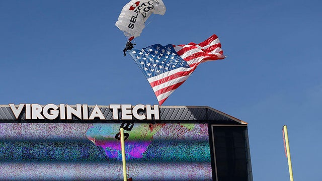 Skydiver crashes into scoreboard Virginia Tech 