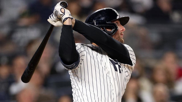 Ryan McMahon #19 of the New York Yankees watches his eighth inning two-run home run against the Kansas City Royals at Yankee Stadium on April 17, 2026 in New York City. 