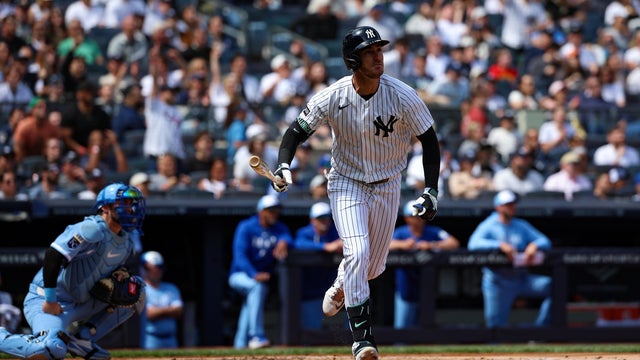 Cody Bellinger #35 of the New York Yankees hits a home run during the game against the Kansas City Royals at Yankee Stadium on April 18, 2026 in New York, New York. 