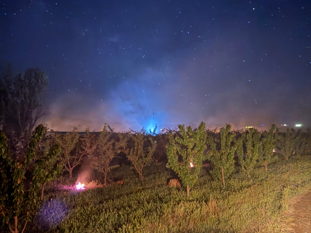 Colorado farm uses nearly 100 campfires to save orchard from spring ...