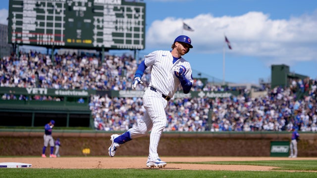Carson Kelly #15 of the Chicago Cubs celebrates a three run home run in the sixth inning against the New York Mets at Wrigley Field on April 18, 2026 in Chicago, Illinois. 