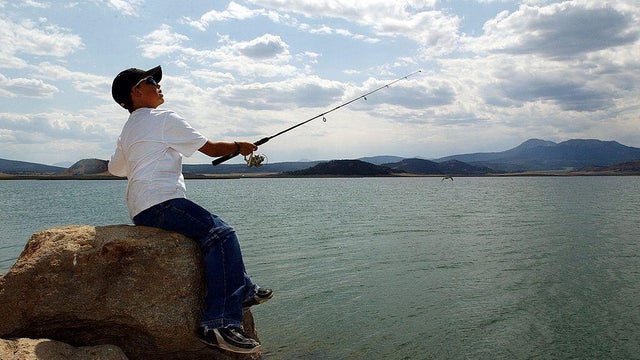 ANTERO RESERVOIR,CO--Mitch Snow, 11, from Colorado Springs, casts his line into the south shore of Antero Reservoir, just south of Fairplay Wednesday afternoon with hopes of catching his limit of trout fish. The Denver Water Board wants to drain the reser 