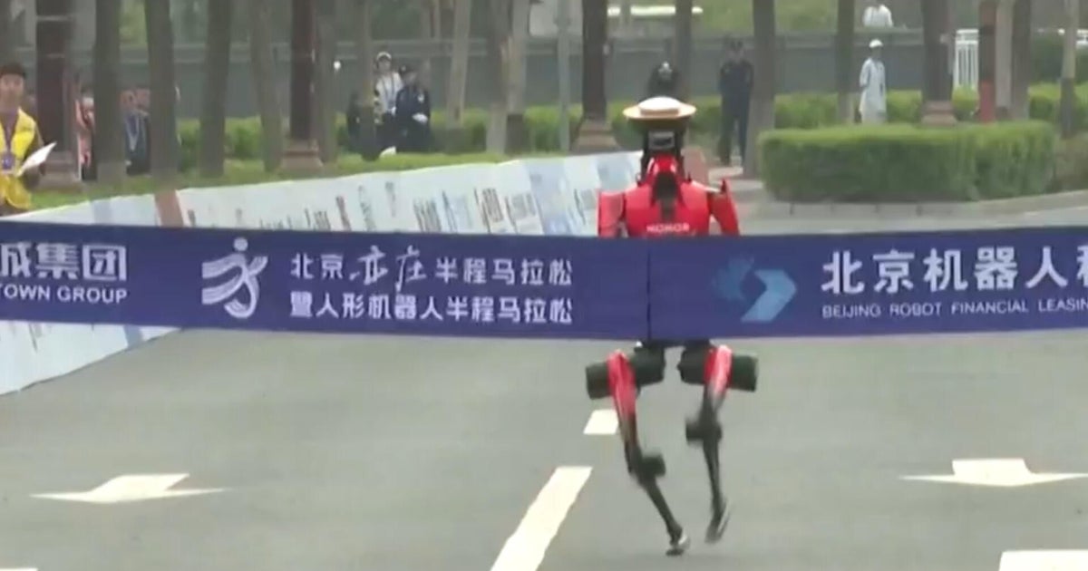 Video shows humanoid robot setting record in half-marathon in Beijing