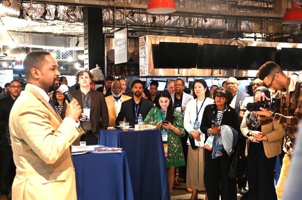 People post for photos at the WTC Greater Philadelphia Global Forum 