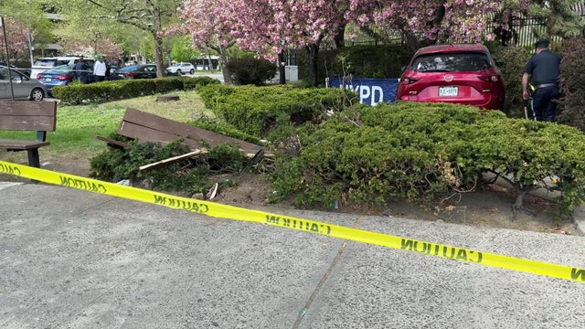 Smashed bench and car nearby 