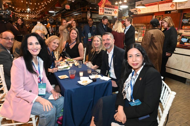 People post for photos at the WTC Greater Philadelphia Global Forum 