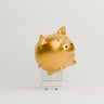 Golden Piggy bank on shopping cart 