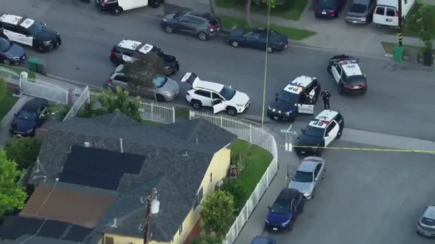 Generic police lights and yellow police tape at crime scene 