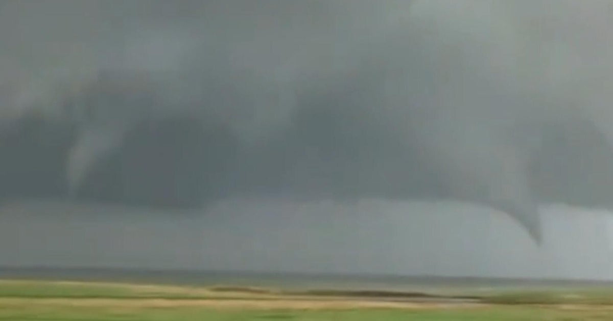 Storm chasers capture twin tornadoes as severe weather moves through central U.S.