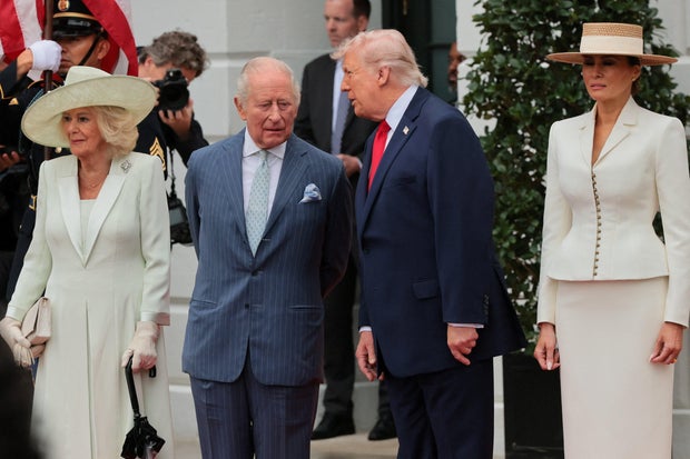 President Trump and first lady Melania Trump greet Britain's King Charles and Queen Camilla during an arrival ceremony on the South Lawn of the White House on April 28, 2026. 