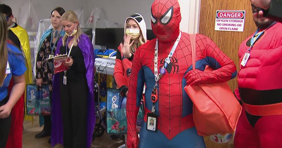 Superheroes visit patients at Denver Health as part of National Superhero Day