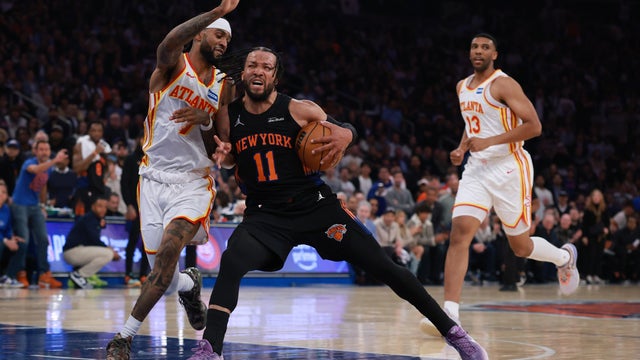 Jalen Brunson #11 of the New York Knicks dribbles against Nickeil Alexander-Walker #7 of the Atlanta Hawks during the first half of Game Five of the Eastern Conference First Round NBA Playoffs at Madison Square Garden on April 28, 2026 in New York City. 