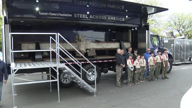 Steel beam recovered from wreckage of Ground Zero displayed in truck 