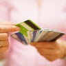 woman choose one credit card, concept of  credit  debt 