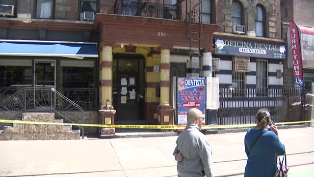 Crime scene tape outside Inwood apartment building 