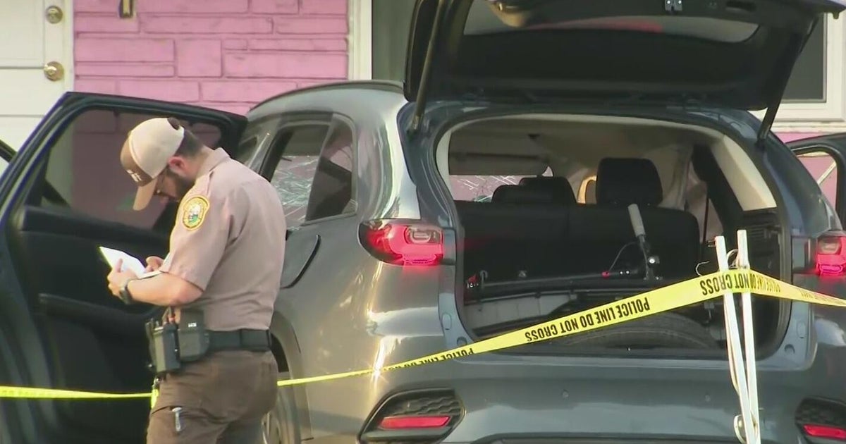 Person injured after car crashes inches from plowing into Miami-Dade home