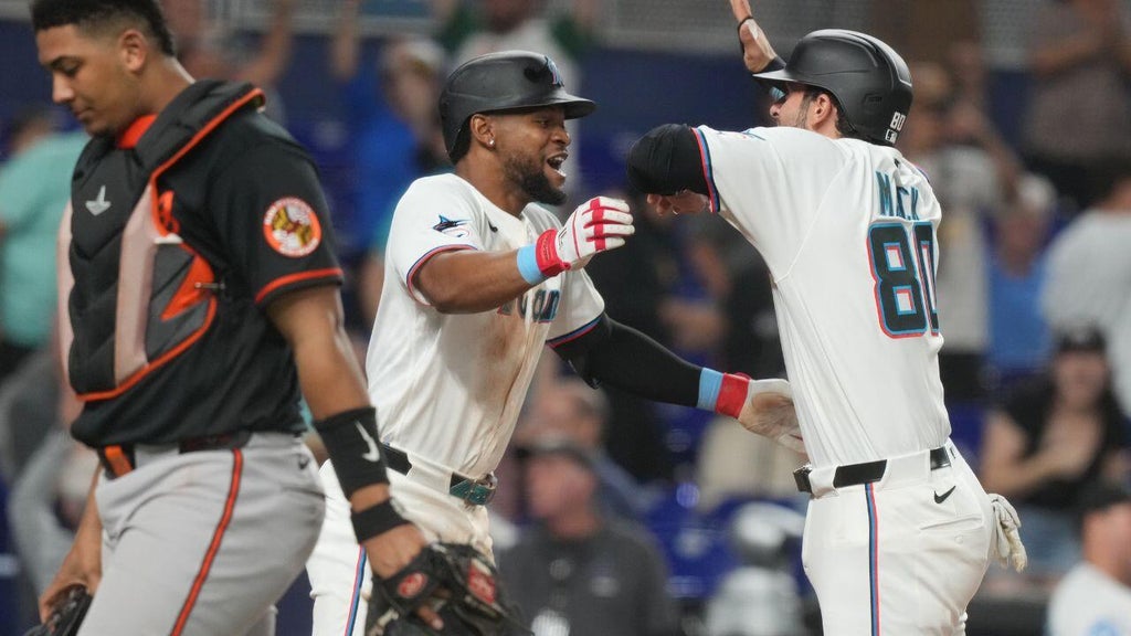 Miami Marlins beat the Baltimore Orioles 4-3 to avoid series sweep
