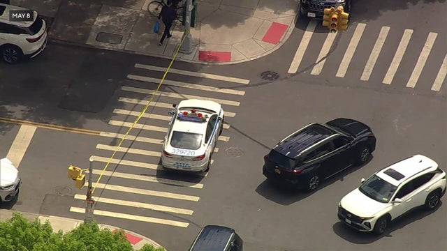 Police car parked in crosswalk 