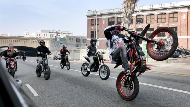 Illegal dirtbike riders take over streets downtown Los Angeles 