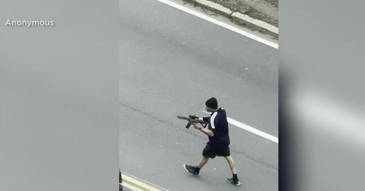 Disturbing video shows man with gun opening fire outside Boston critically injuring 2 people