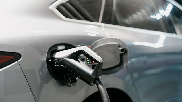 The electric car is charging 