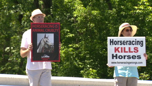 Protesters outside the Preakness Stakes